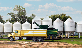 truck and grain storage bins